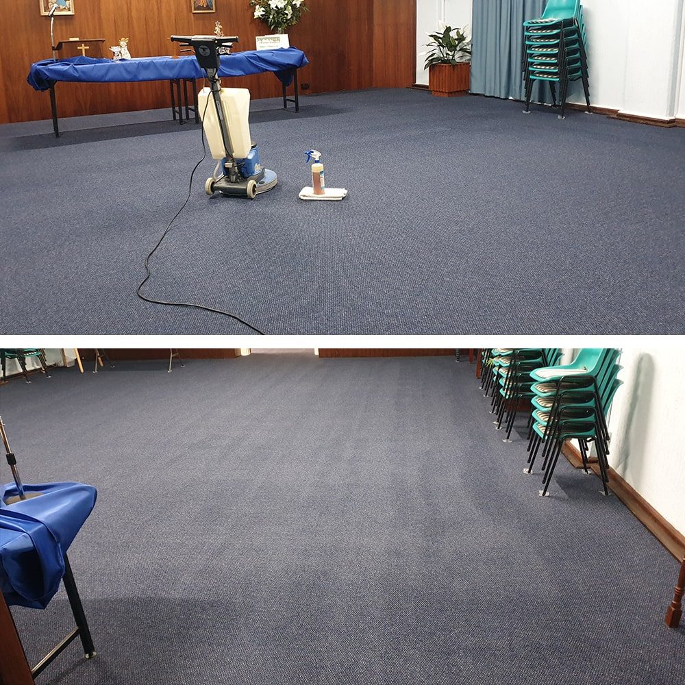 Church hall carpet cleaning in Perth, the blue carpet under our rotary machine before and the finished, even floor after.