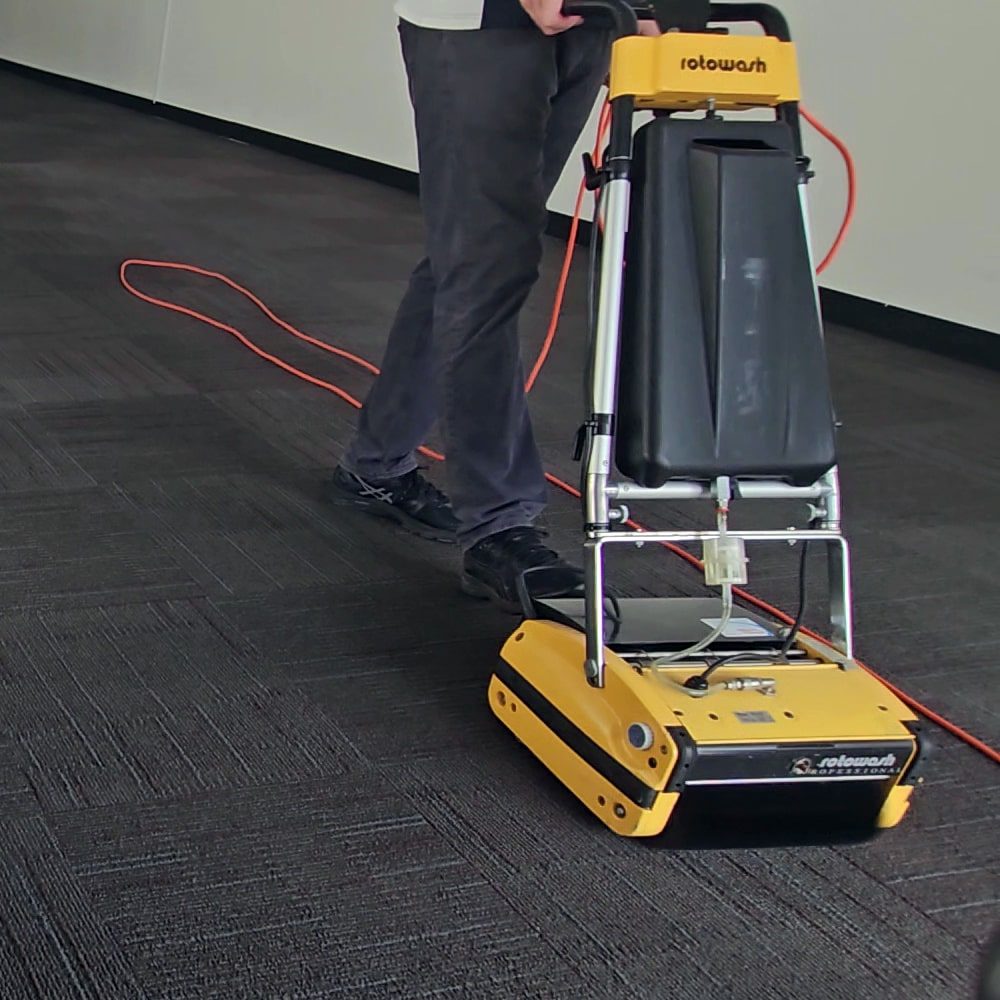 Commercial carpet cleaning in a Perth city office, carpet tiles cleaned after hours so the floor is ready for the next working day.